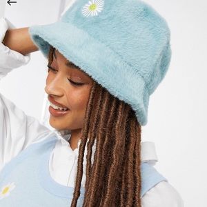 ASOS DESIGN fluffy bucket hat with daisy embroidery
